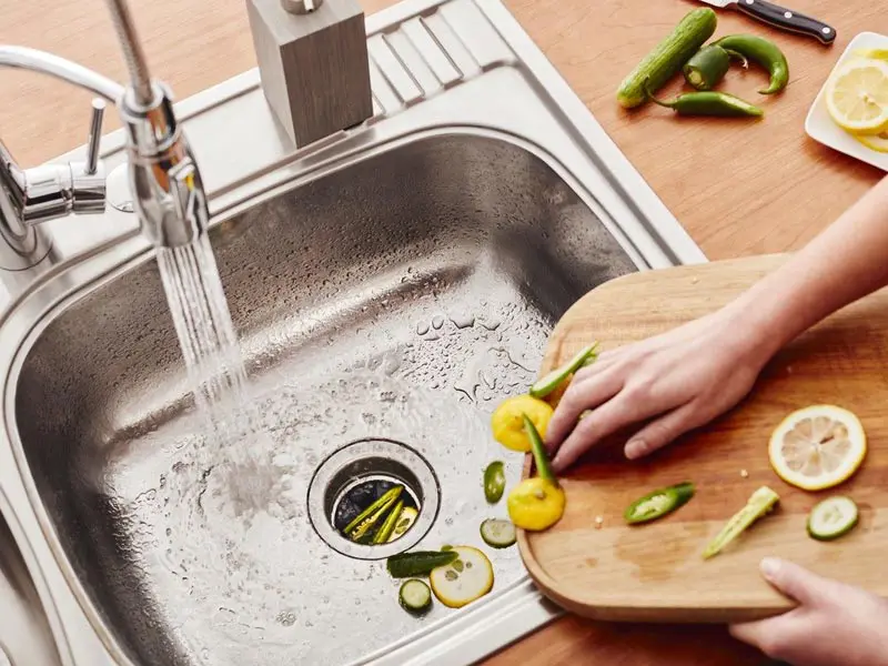 Food preparation and cleanup at a kitchen sink