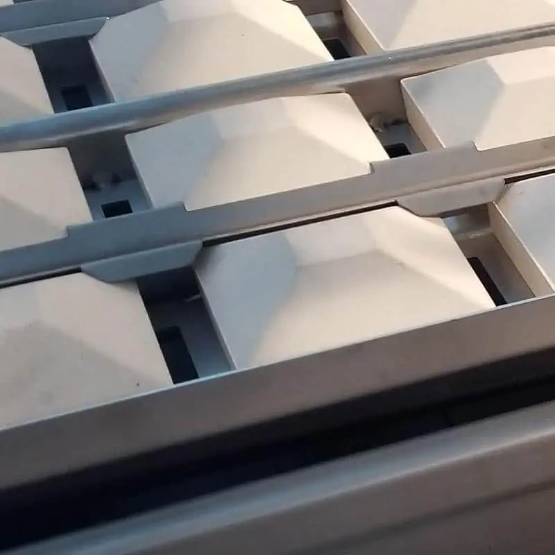 Ceramic briquettes inside an XO grill