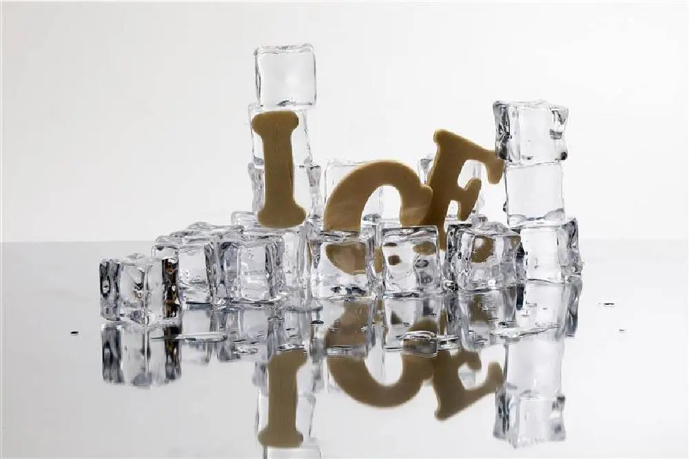 A pile of clear, cubed ice slowly melts, one of the many different types of ice that can affect your beverages. The word “Ice” falls as the pile of cubes melt. A pile of clear, cubed ice slowly melts, one of the many different types of ice that can affect your beverages. The word “Ice” falls as the pile of cubes melt.