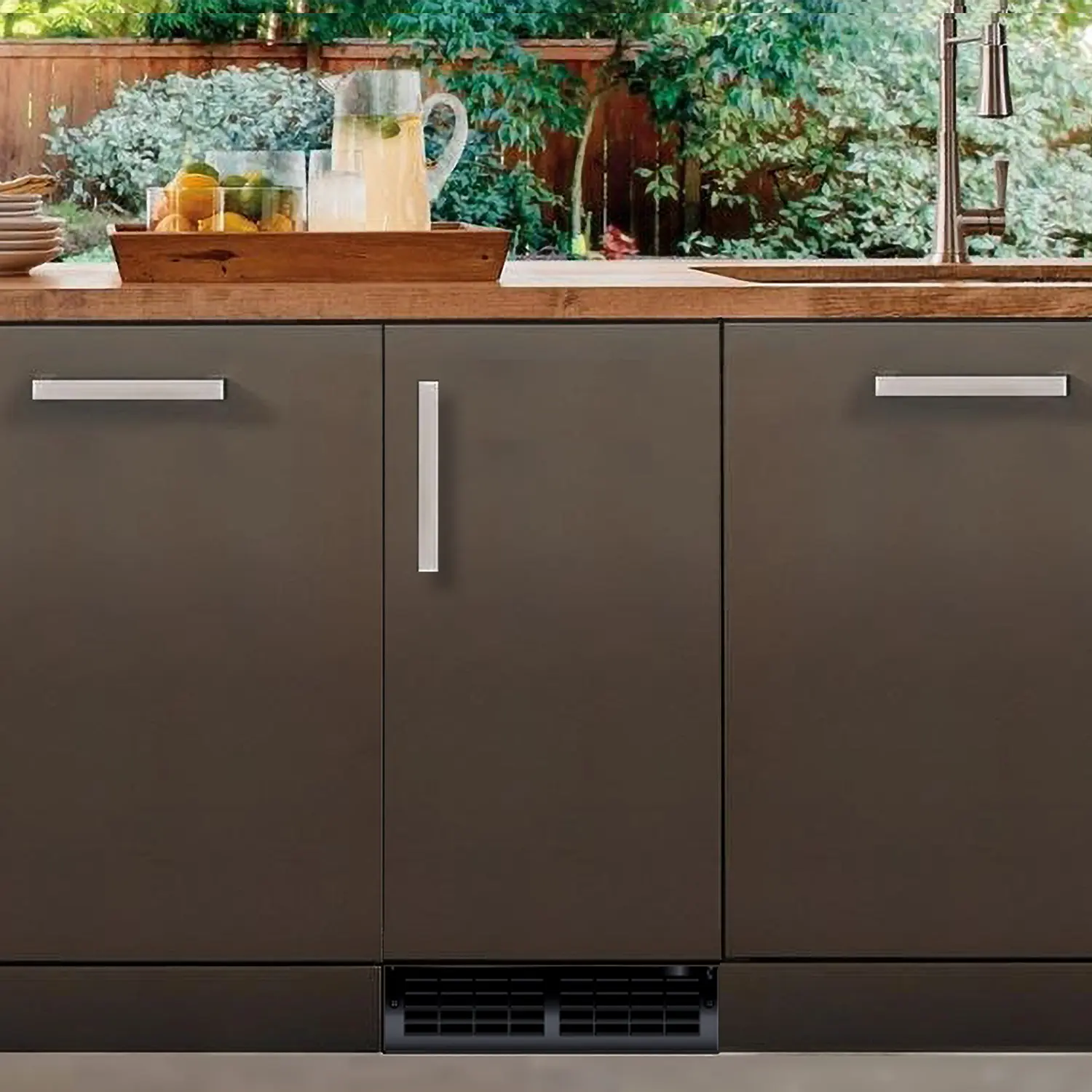 XO panel-ready nugget ice maker beneath a kitchen countertop